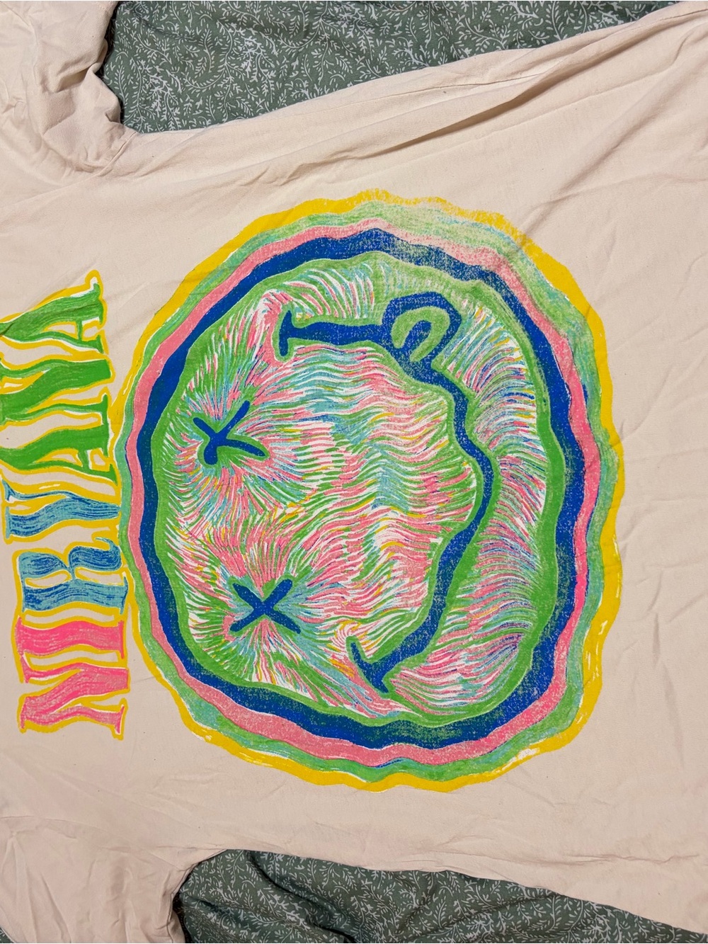 NIRVANA Pink Tee with Multicolor Smiley Graphic